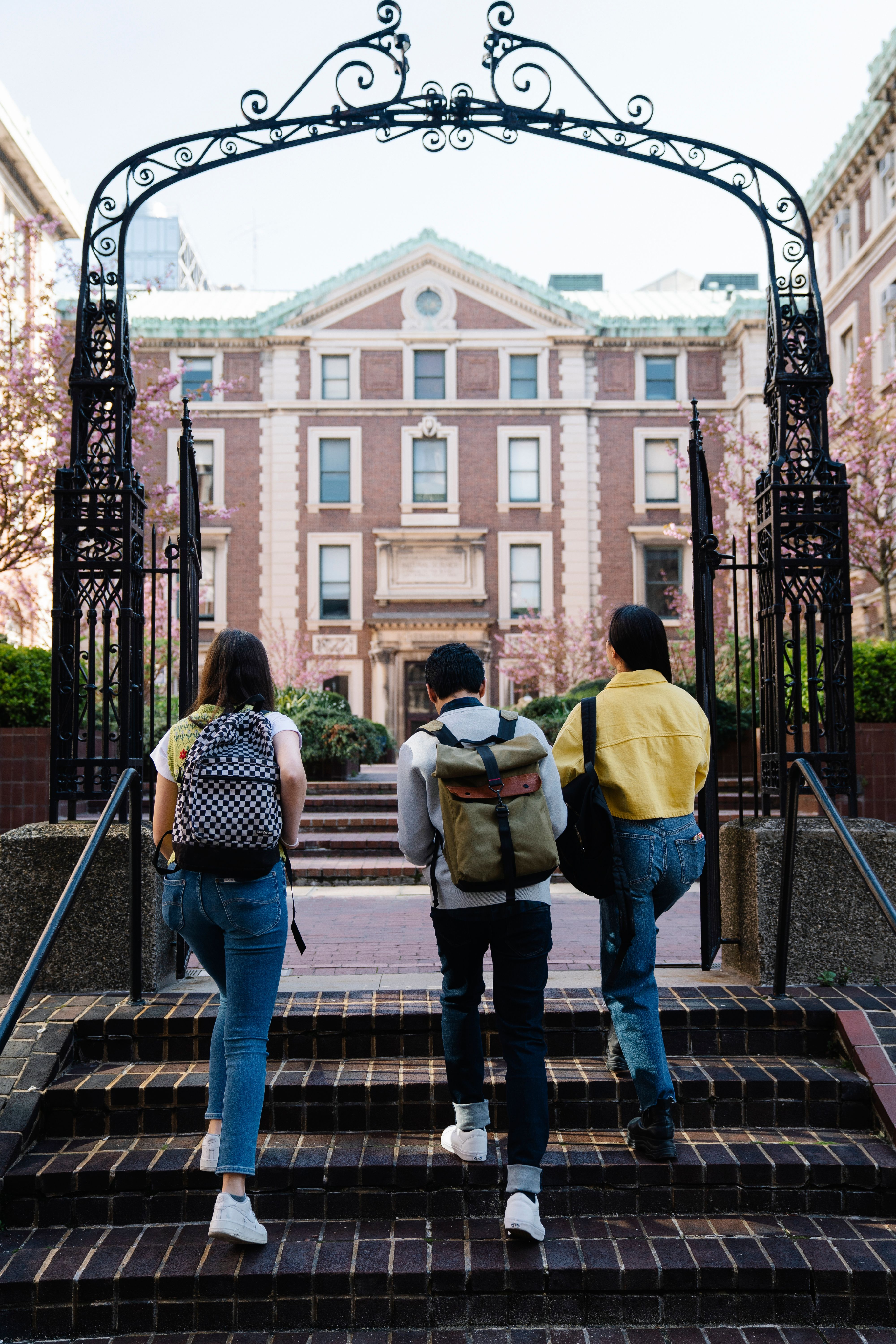 Students with backpacks on university campus
